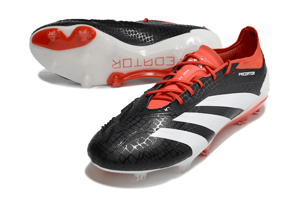 Chuteira Adidas Predator Elite FG - Preta, Branca e Laranja em destaque com design vibrante e tecnologia de ponta.