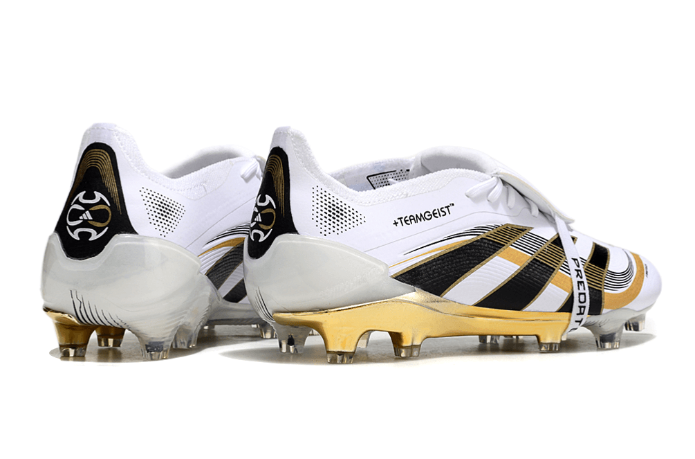 Chuteira Adidas Predator Elite FG Tongue Branca e Dourada "Teamgeist" com design icônico e cores ousadas.