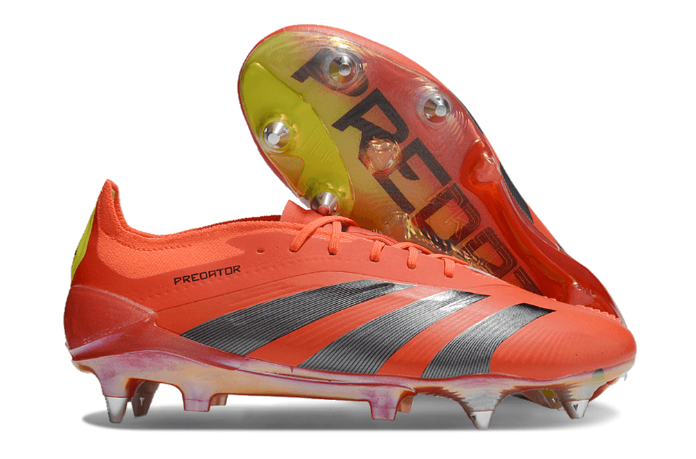 Chuteira Adidas Predator Elite SG com solado SG mostrando ótimo desempenho em gramados molhados.