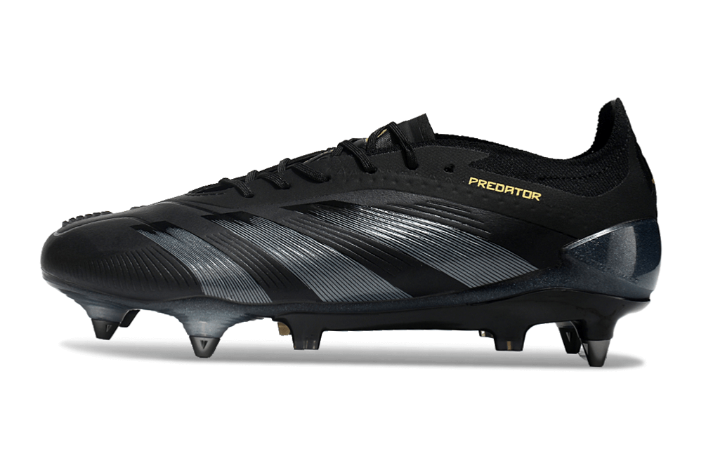 Chuteira Adidas Predator Elite SG em preto com design inovador para desempenho em gramados macios.