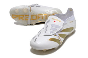 Chuteira Adidas Predator Elite Tongue FG - Branca e Dourada com detalhes dourados e design elegante.