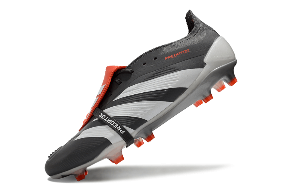 Chuteira Adidas Predator Elite Tongue FG - Cinza e Branca em ângulo, destacando seu design moderno e tecnologia avançada.