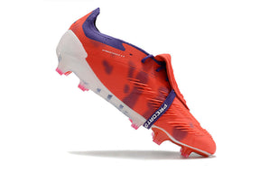 Chuteira Adidas Predator Elite Tongue FG - Laranja e Branca em ação, destacando o design e tecnologias modernas.