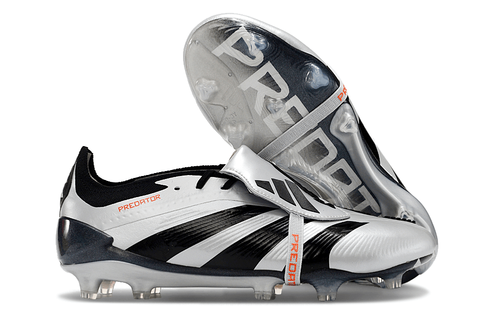 Chuteira Adidas Predator Elite Tongue FG - Preta e Branca em ângulo lateral, destacando design e tecnologia.