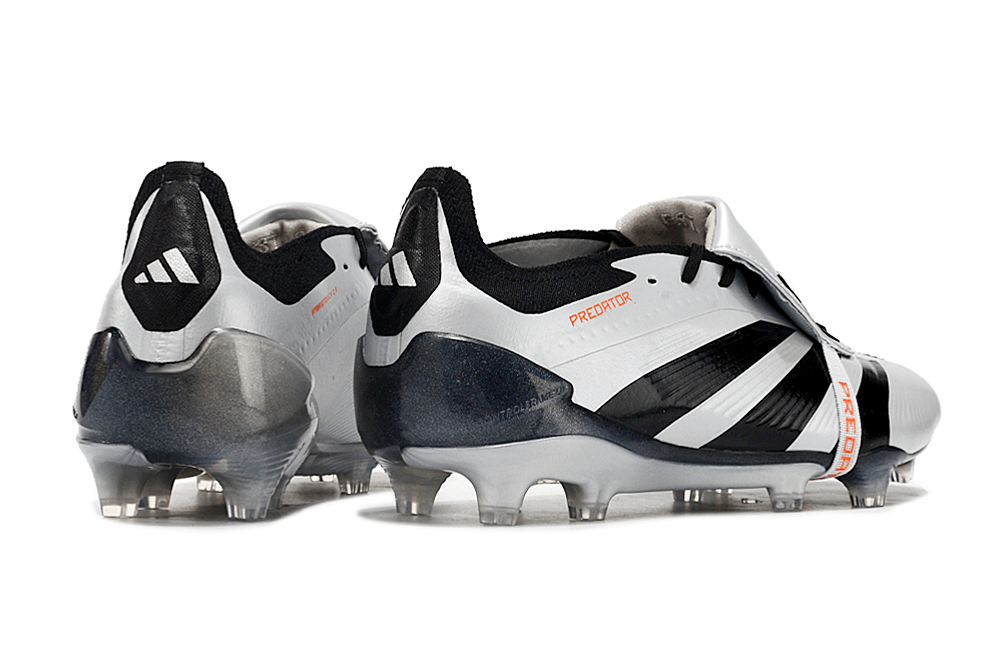 Chuteira Adidas Predator Elite Tongue FG - Preta e Branca com design clássico e tecnologia avançada