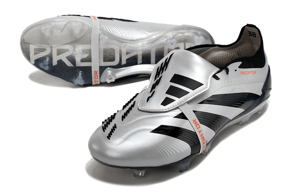 Chuteira Adidas Predator Elite Tongue FG - Preta e Branca com design clássico e tecnologia avançada para controle no futebol.