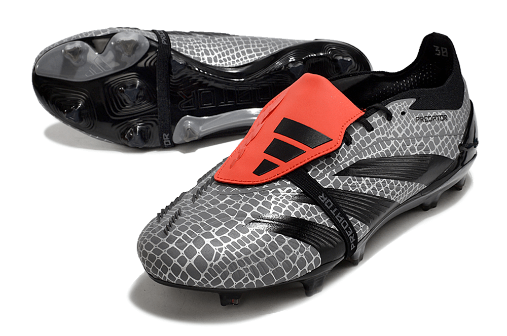 Chuteira Adidas Predator Elite Tongue FG - Preta e Cinza com detalhes em vermelho e design sofisticado.
