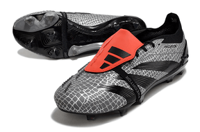 Chuteira Adidas Predator Elite Tongue FG - Preta e Cinza com detalhes em vermelho e design sofisticado.
