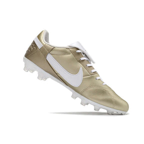 Chuteira Campo Nike Premier 3 FG Dourada vista lateral com detalhe em branco.
