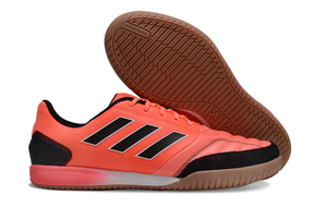 Chuteira Futsal Adidas Competition Top IC Laranja e Preta com design ousado e solado adequado para futsal.