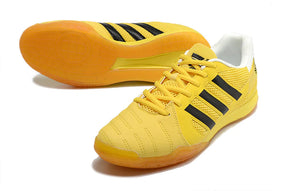 Chuteira Futsal Adidas Top Sala IC Amarelo e Preto em destaque, ideal para jogadores de futsal.