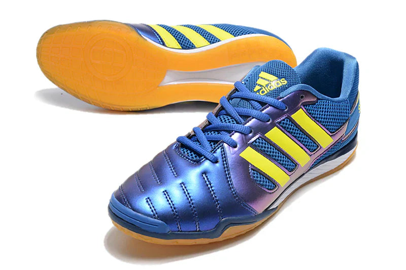 Chuteira Futsal Adidas Top Sala IC Azul Escuro destacando sua cor vibrante e design leve para desempenho em quadra.