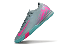 Chuteira Futsal Nike Mercurial Air Zoom Vapor 16 IC - Azul e Rosa em ângulo, destacando o design moderno.