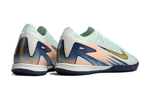 Chuteira Futsal Nike Mercurial Air Zoom Vapor 16 IC - Azul em destaque na cor azul vibrante com design aerodinâmico.