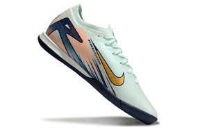 Chuteira Futsal Nike Mercurial Air Zoom Vapor 16 IC - Azul em fundo branco, mostrando design aerodinâmico.