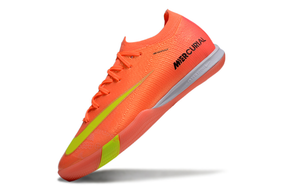 Chuteira Futsal Nike Mercurial Air Zoom Vapor 16 IC - Laranja e Verde em destaque com design vibrante.