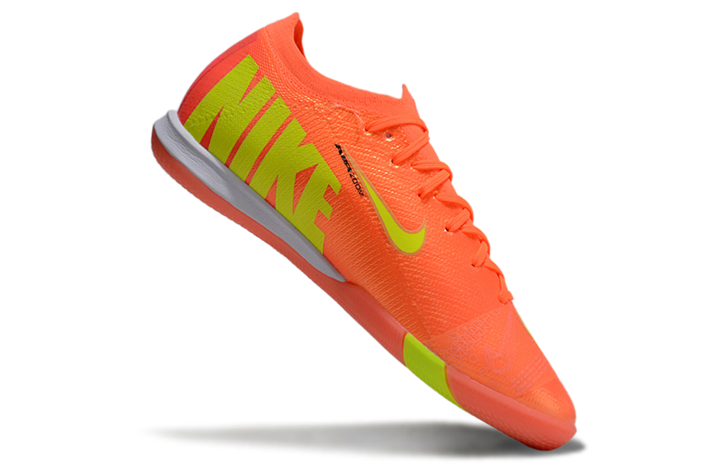 Chuteira Futsal Nike Mercurial Air Zoom Vapor 16 IC - Laranja e Verde em destaque com design vibrante.