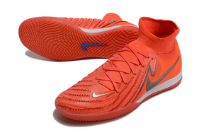 Chuteira Futsal Nike Phantom Luna IC - Vermelha "Halaand" com design vibrante e superfície texturizada para controle de bola.
