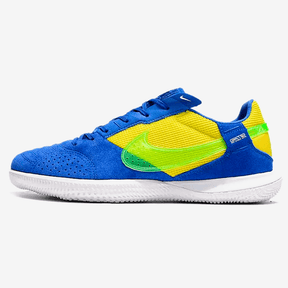 Chuteira Futsal Nike Street Gato IC Azul, Amarelo e Verde com design vibrante e sola de borracha para tração.