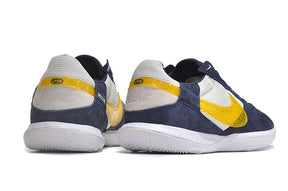 Chuteira Futsal Nike Street Gato IC - Branca, Azul e Amarela traseira com detalhes em amarelo e azul.