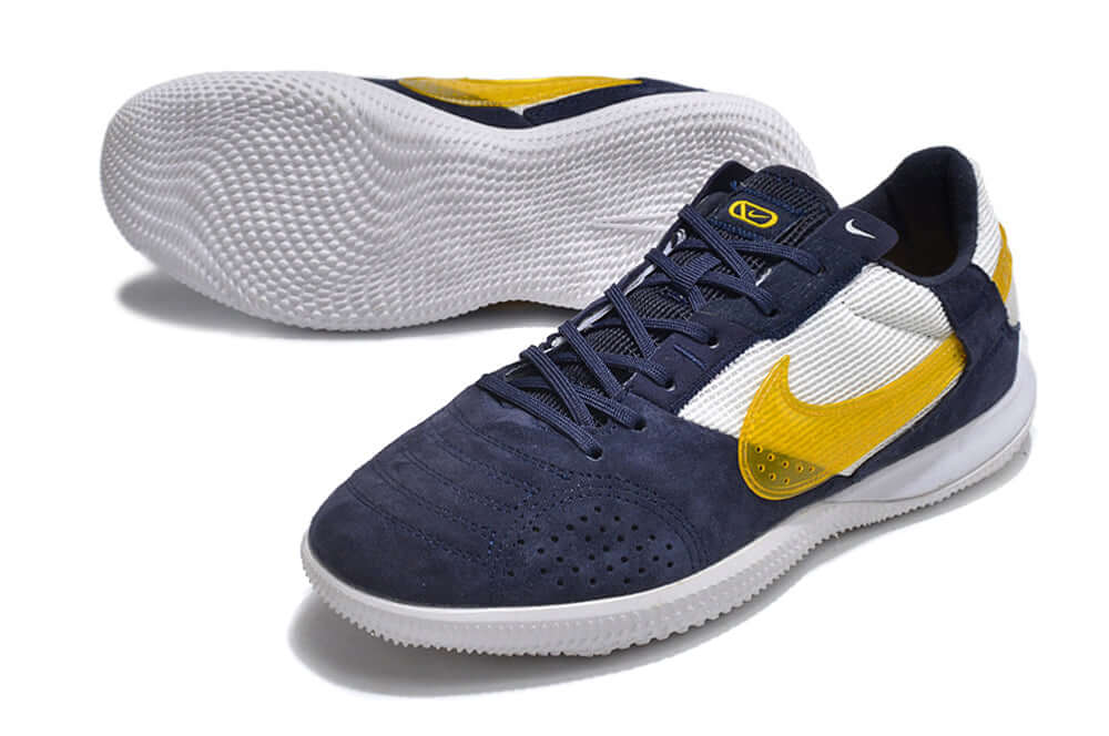 Chuteira Futsal Nike Street Gato IC - Branca, Azul e Amarela em vista lateral com design moderno e sola IC.