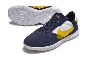 Chuteira Futsal Nike Street Gato IC - Branca, Azul e Amarela em vista lateral com design moderno e sola IC.