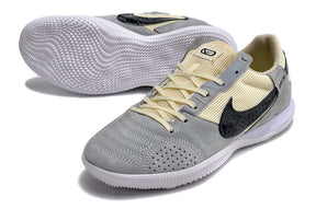 Chuteira Futsal Nike Street Gato IC - Cinza, Bege e Preta em destaque, com design moderno e sola IC ideal para quadras internas.