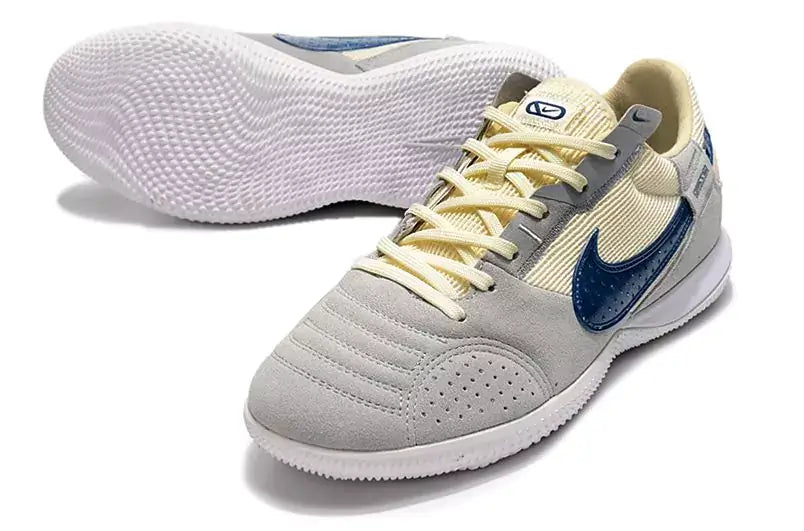 Chuteira Futsal Nike Street Gato IC Cinza e Verde com design moderno e conforto excepcional para jogadores.