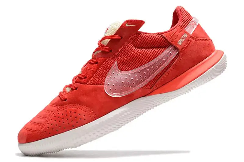 Chuteira Futsal Nike Street Gato IC Vermelha e Branca com design inovador e sola IC para quadras internas.