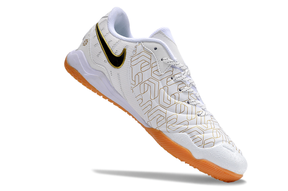 Chuteira Futsal Tiempo 10 Legend Elite IC Branca com detalhes em preto e sola laranja, ideal para futsal.