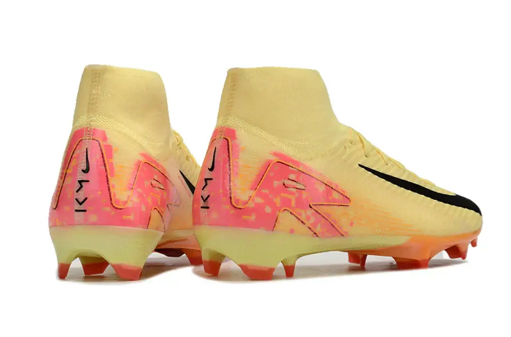 Chuteira Nike Air Zoom Mercurial Superfly 10 Elite FG com design amarelo e detalhes em rosa e preto.