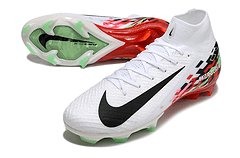 Chuteira Nike Air Zoom Mercurial Superfly 10 Elite FG disponível em branco com detalhes vermelhos e verdes.