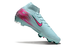 Chuteira Nike Air Zoom Mercurial Superfly 10 Elite FG-  Pack Prism com design em azul e detalhes em rosa.