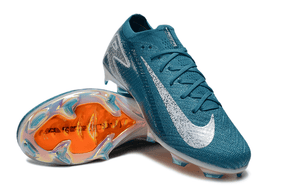 Chuteira Nike Air Zoom Mercurial Vapor 16 Elite FG Azul e Branca com detalhe em prata e sola laranja.