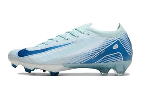 Chuteira Nike Air Zoom Mercurial Vapor 16 Elite FG - Azul em azul vibrante com design aerodinâmico.