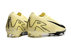Chuteira Nike Air Zoom Mercurial Vapor 16 Elite FG Bege e Preto, modelo amarelo e preto, ideal para futebol.