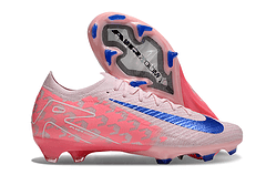 Chuteira Nike Air Zoom Mercurial Vapor 16 Elite FG Laranja e Azul com design aerodinâmico para desempenho em campo.