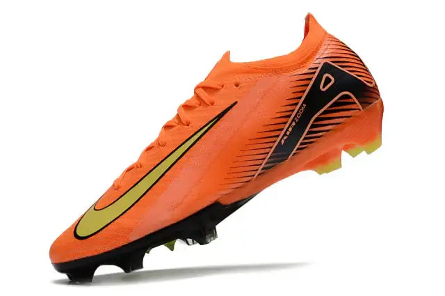 Chuteira Nike Air Zoom Mercurial Vapor 16 Elite FG - Laranja vista lateral, ideal para jogadores que buscam desempenho e velocidade.