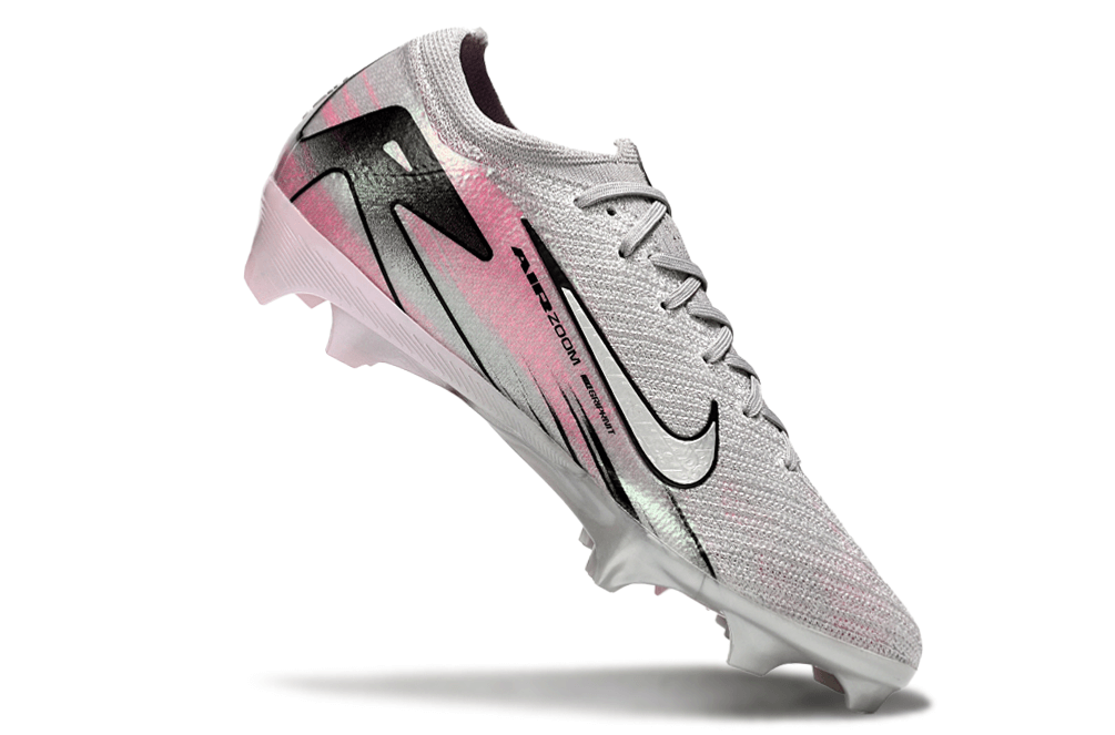 Chuteira Nike Air Zoom Mercurial Vapor 16 Elite FG - Prata e Rosa em ângulo, destacando design inovador e tecnologia de ponta.
