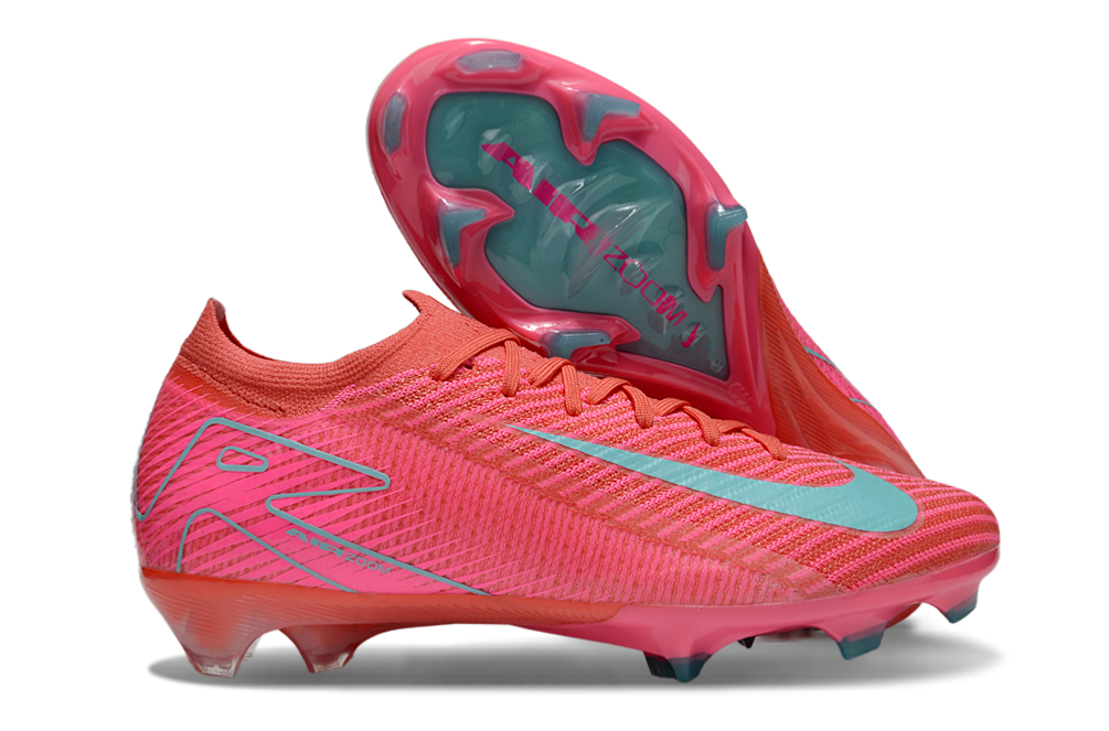 Chuteira Nike Air Zoom Mercurial Vapor 16 Elite FG - Rosa e Azul - Pack Mad Energy em ângulo lateral