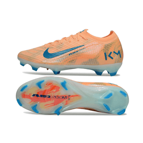 Chuteira Nike Air Zoom Mercurial Vapor 16 "Mbappé" em laranja e azul, com sola transparente e design aerodinâmico.