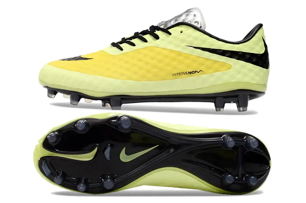 Chuteira Nike Hypervenom Elite FG destacada em amarelo com sola preta, ideal para velocidade e controle no campo.