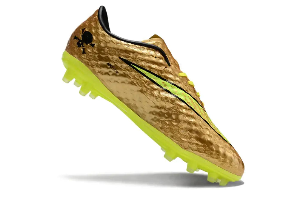 Chuteira Nike Hypervenom Elite FG - Dourada com design premium e tecnologia avançada para máximo desempenho em campo.