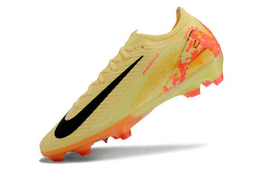Chuteira Nike Mercurial Air Zoom Vapor 16 Elite FG Amarelo e Laranja, desenho moderno e cores vibrantes.