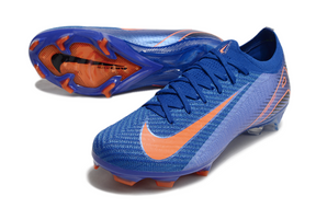 Chuteira Nike Mercurial Air Zoom Vapor 16 Elite FG Azul e Laranja em destaque com design aerodinâmico e cores vibrantes.