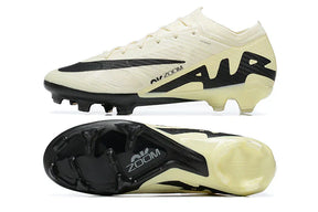 Chuteira Nike Mercurial Vapor 15 Air Zoom FG Bege e Preta com tecnologia de amortecimento e design elegante.