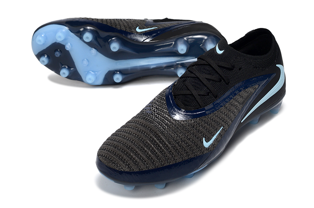 Chuteira Nike Phantom 6 Elite AG Preta - Shadow Pack em ângulo, destacando a tecnologia e design para desempenho nos campos sintéticos.