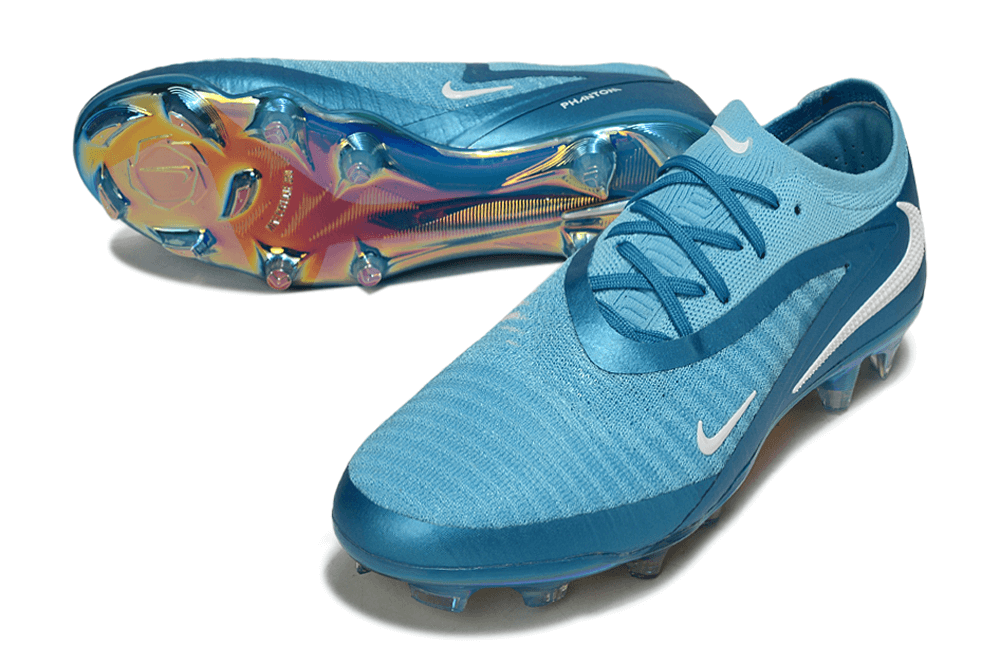Chuteira Nike Phantom 6 Elite FG - Azul vista lateral com detalhes em azul e solado colorido.