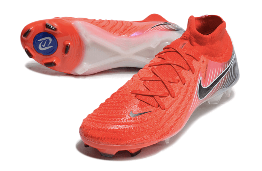 Chuteira Nike Phantom Luna Elite NU FG Vermelha, Preto e Branco em ângulo lateral com sola FG.