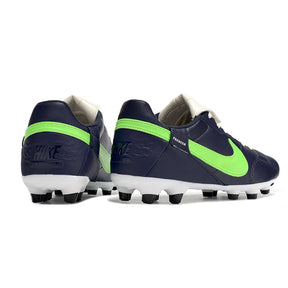 Chuteira Nike Premier 3 FG Azul e Verde com design clássico e sola FG para aderência em campos naturais.